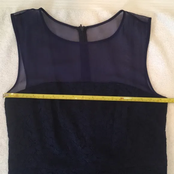 DVF navy blue lace Nisha dress with sheer navy top.