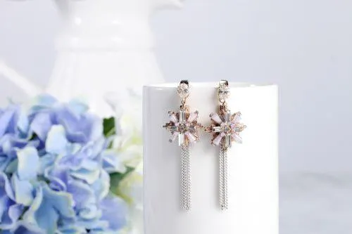 Eight pointed star tassel earrings
