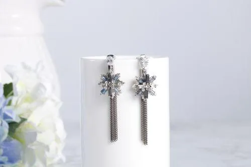 Eight pointed star tassel earrings