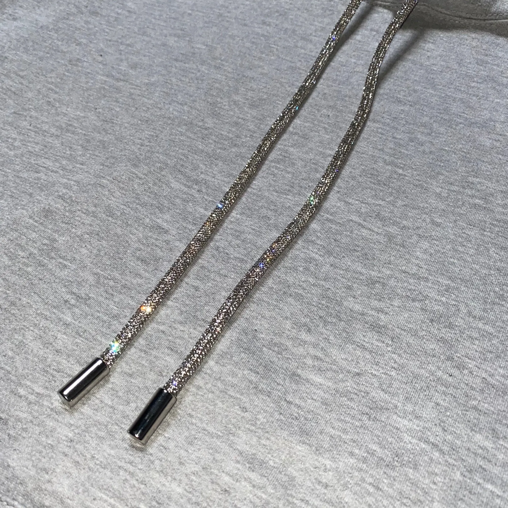 SLEEVELESS HOODIE WITH BLING STRING