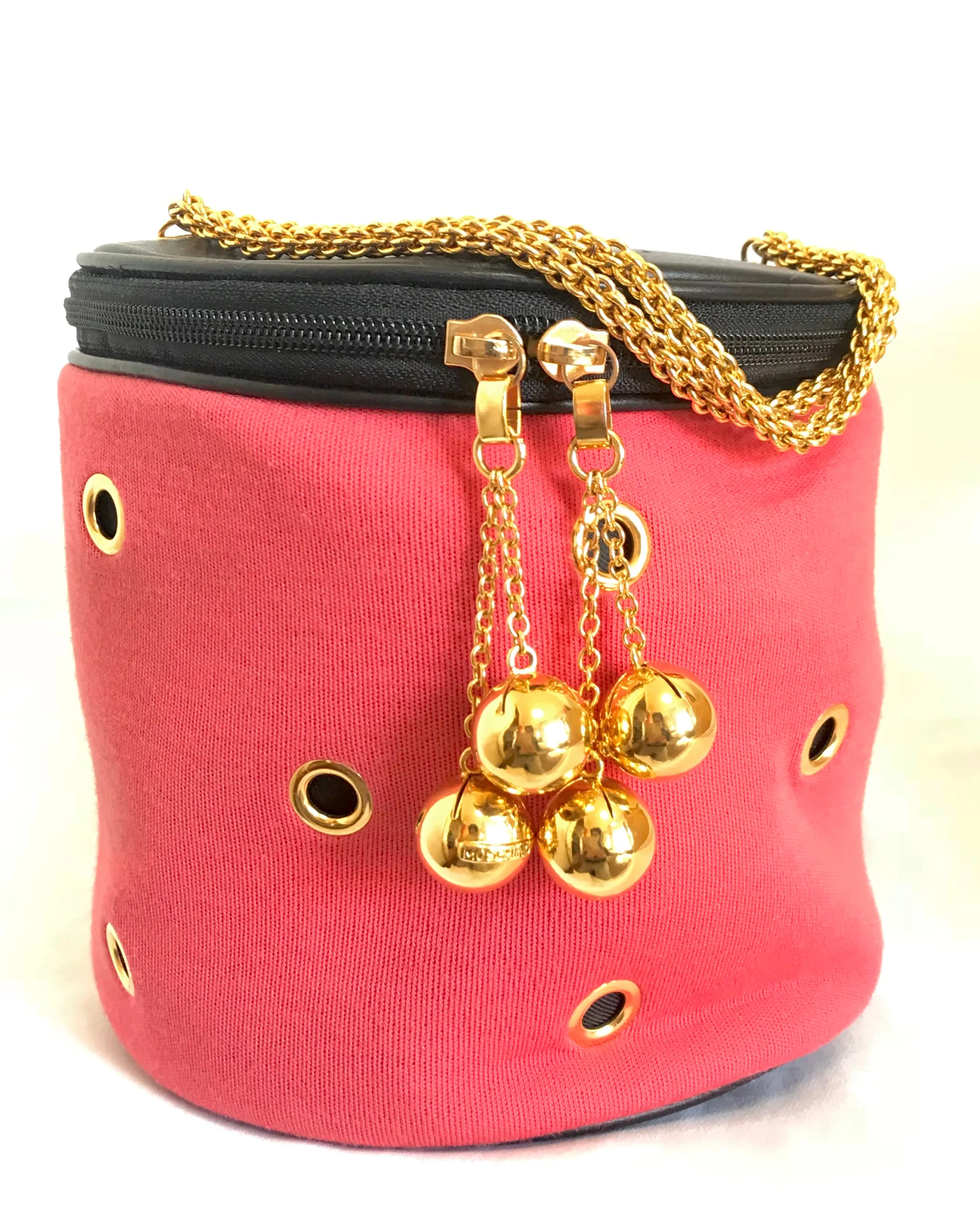 Vintage Moschino by Redwall lunchbox design red jersey and black leather handbag with golden eyelets and ball charms. 0506289
