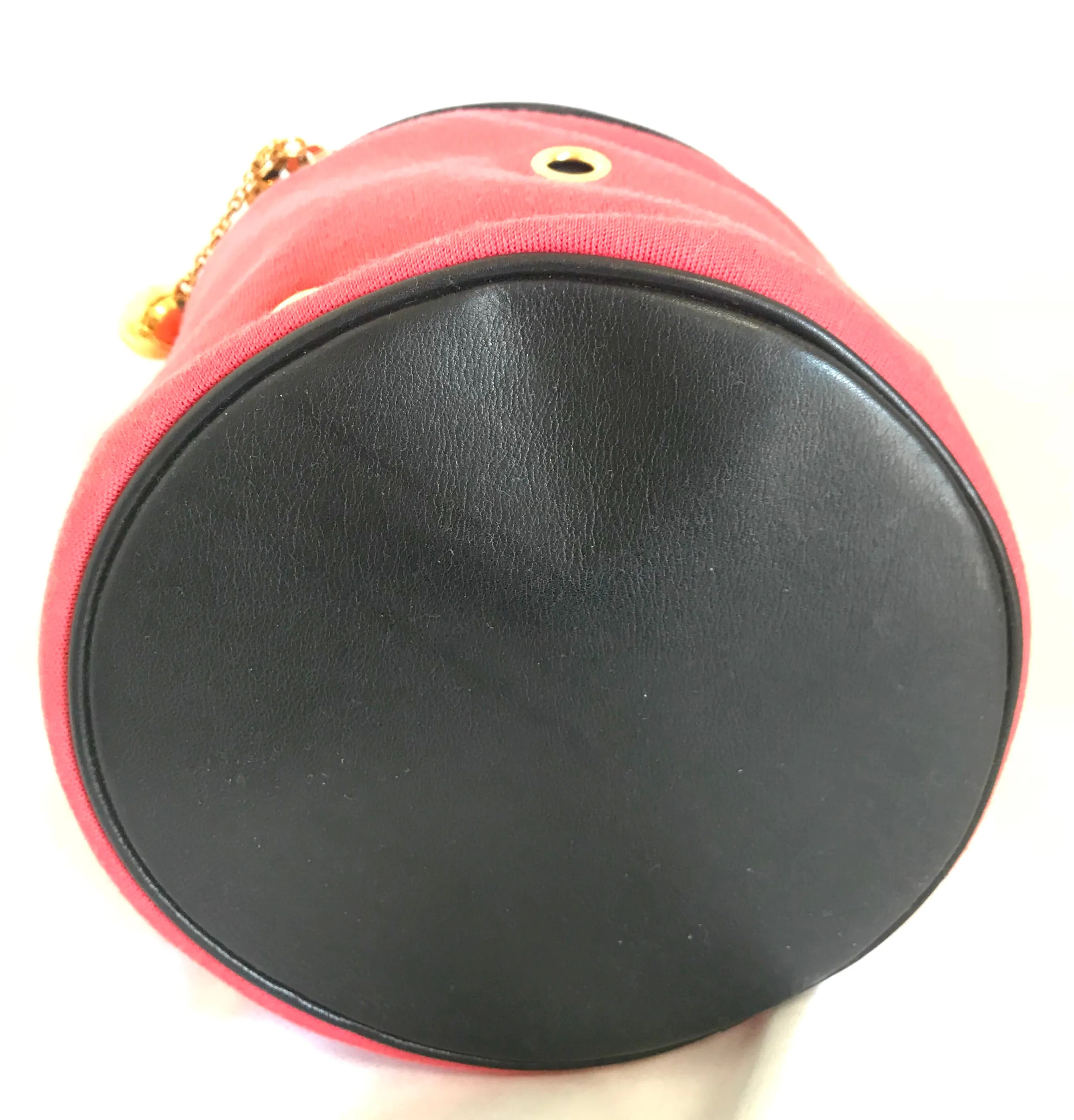 Vintage Moschino by Redwall lunchbox design red jersey and black leather handbag with golden eyelets and ball charms. 0506289