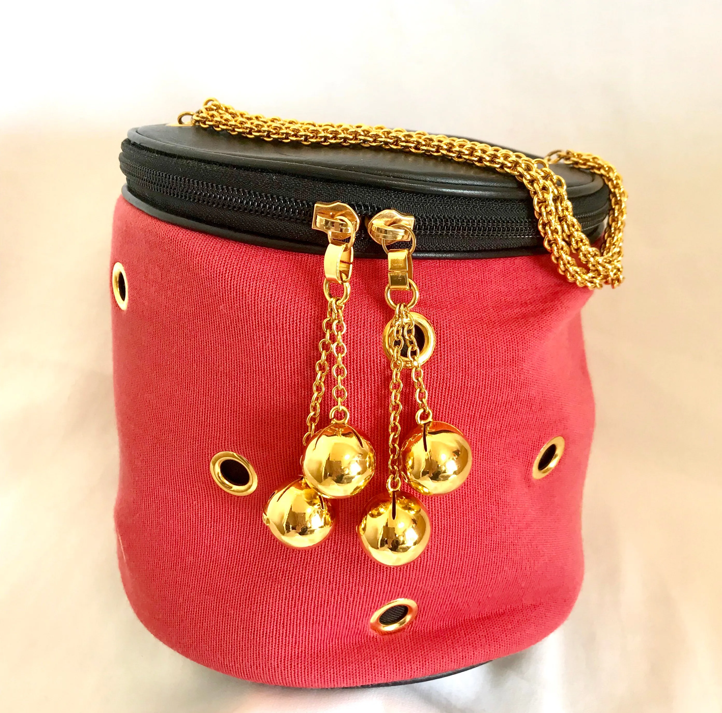 Vintage Moschino by Redwall lunchbox design red jersey and black leather handbag with golden eyelets and ball charms. 0506289